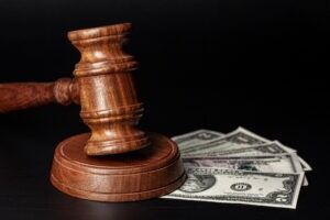 wooden law bevel and money